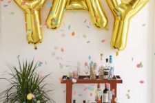 15 gold letter party balloons for glam celebrations