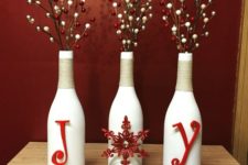 15 holiday centerpiece with white bottles, yarn and red letters