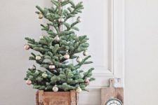 16 tiny Christmas tree with small colorful ornaments