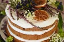 a gorgeous and delicious winter cake with citrus and winter flowers is a perfect Christmas tea party dessert