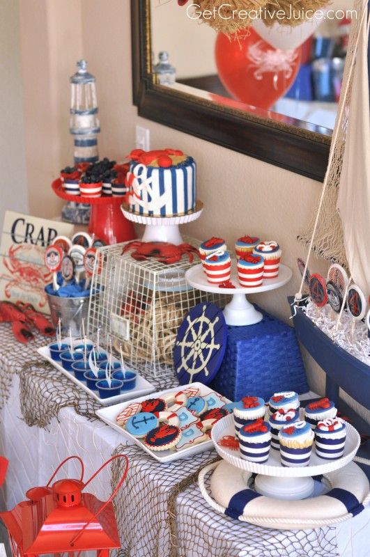 funny and bold kids' dessert table in seaside style