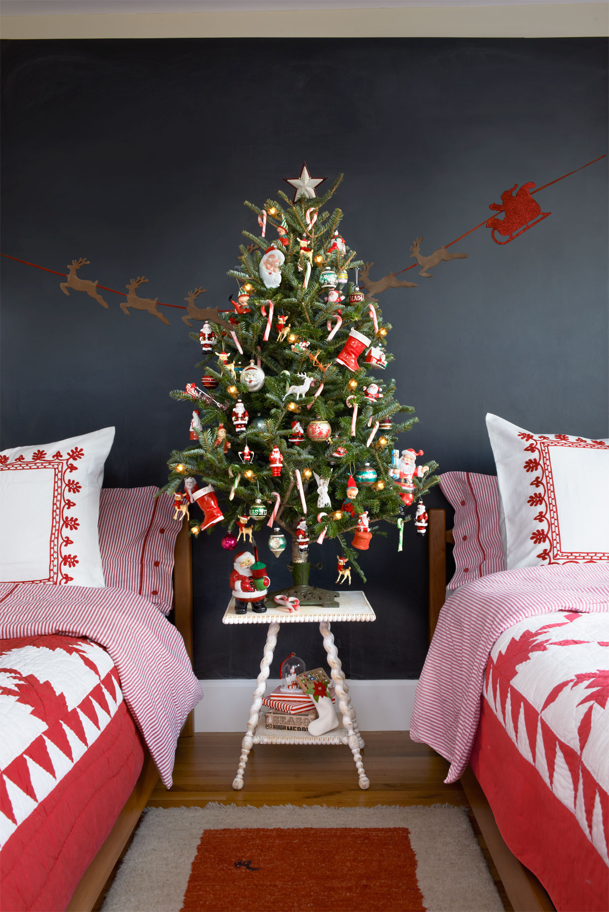 A small tree decorated with colorful ornaments is a great idea for a kid's room, let them choose the decor themselves