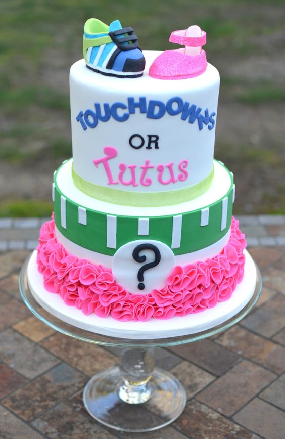 fun gender reveal cake with shoes