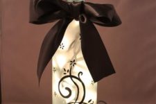 29 wine bottle with LEDs and silk ribbon
