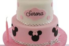 32 two tier party cake topped with ears and a bow