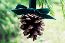 DIY hanging pinecone ornaments with velvet bows