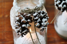 DIY winter luminaries with snowy pinecones