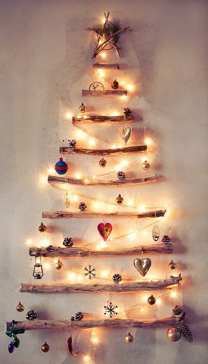 DIY Christmas tree made of tree branches (via uncookiecutter.com)