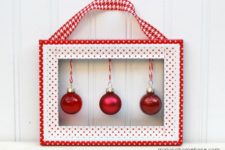 DIY washi tape wall hanging with ornaments