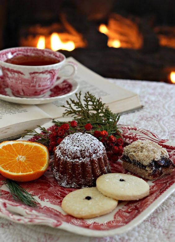 red printed porcelain with hot tea, cookies and cakes and some fruit is a cool idea for a Christmas tea party