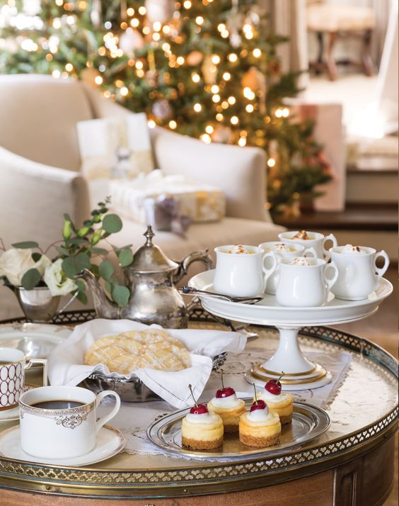 some sweets served for the tea party, white porcelain, greenery and hot chocolate is a cool solution