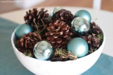 03 a bowl with pinecones and blue ornaments