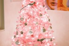 04 lit up pink Christmas tree with ivory and silver ornaments