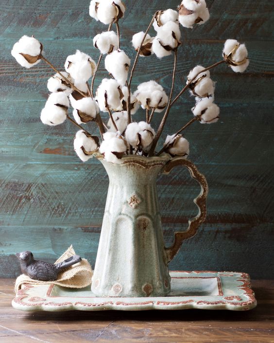 cotton stems in a vintage pitcher will add shabby chic