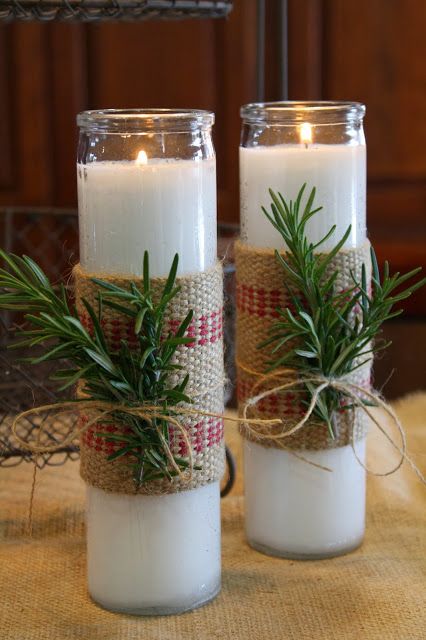dollar store candles wrapped with burlap, rosemary and twine for a rustic look