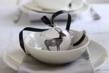 07 minimal monochrome tablescape with a fur tablecloth, black and white ornaments