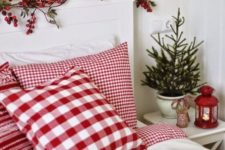 10 red and white Scandi-style bedding echoes with berries on the headboard