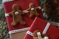 11 kraft paper, red paper, black and white ribbon and gingerbread cookies