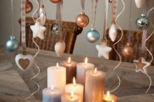 12 a tray with pillar candles and ornaments