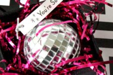 12 disco balls as invitations to a New Year party
