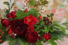 12 red and green Christmas bouquet in a galvanized bucket
