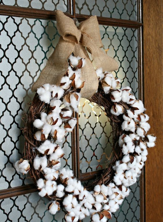top your cotton ball wreath with a burlap bow to hang it
