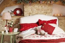 14 a red blanket and pillows hint on the holidays