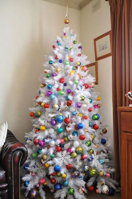 a white but colorful tree looks bold and fun