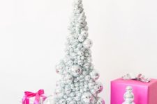 14 make a small silver disco ball Christmas tree and top the gift with these balls