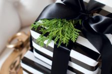15 black and white striped paper, black ribbon and fresh greenery