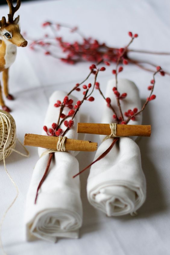 yarn, cinnamon and berries for a rustic setting