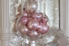 16 place cool pink ornaments into a jar with a lid for cute Christmas decor