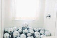 16 put silver disco balls into your bathtub to excite the guests