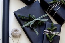 17 black paper, velvet ribbon and evergreen sprigs