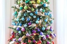 18 if you can’t choose colors for decorating a tree, go for rainbow ornaments