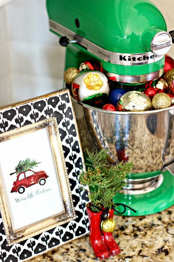 bold ornaments placed into a mixer bowl