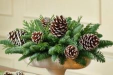 21 a bowl with evergreens and pinecones