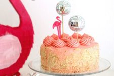 21 top a cake with disco balls and put some of them into a glass vase