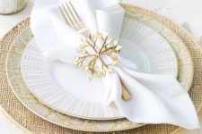 22 pretty gold snowflake with leafy parts for an elegant table setting