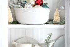 24 put ornaments into bowls and dishes in your galss cabinets