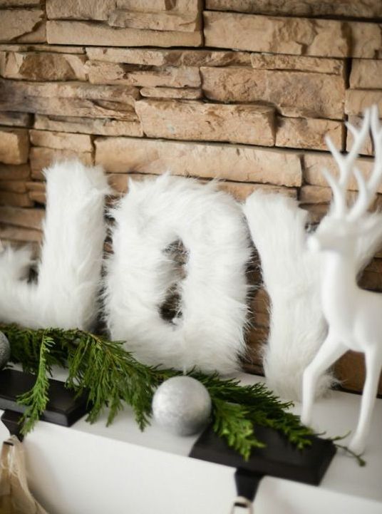 white fur letters for decorating a mantel