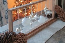 25 wooden frame with white and silver ornaments is a unique centerpiece