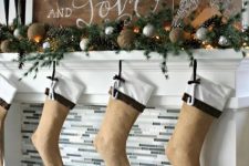 a cozy rustic Christmas mantel decor idea