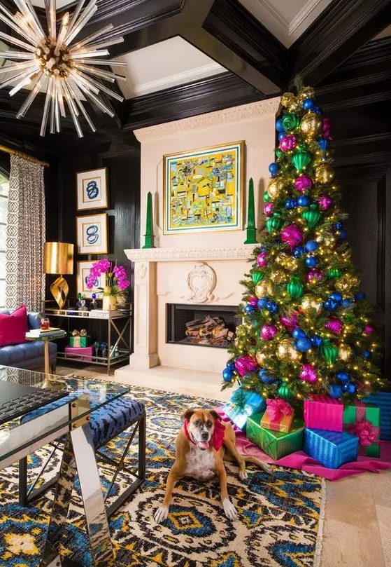 A catchy Christmas tree styled with jewel tone oversized ornaments is a bold and cool decor statement