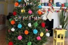 all pompom Christmas tree decor with ornaments and pompom letters for fun, so budget-friendly