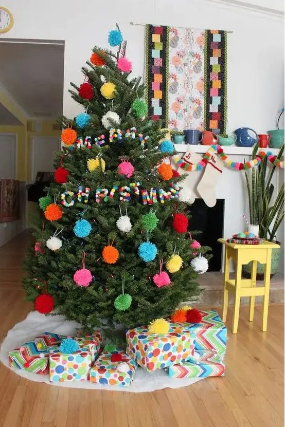 all pompom Christmas tree decor with ornaments and pompom letters for fun, so budget-friendly