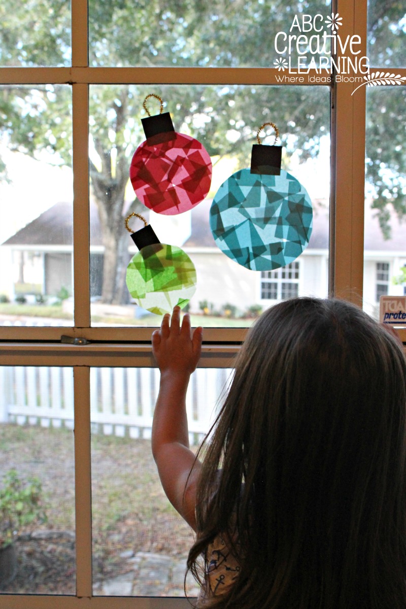 DIY glass stained window ornaments for kids to make (via abccreativelearning.com)