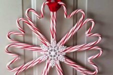 03 a candy cane wreath with snowflakes and red ribbon