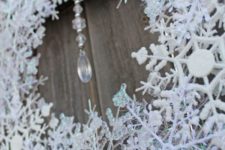 03 dollar store snowflakes in a wreath with crystals