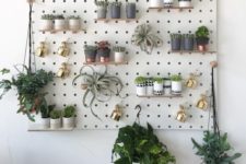 06 a pegboard can accomodate a lot of planters in different ways